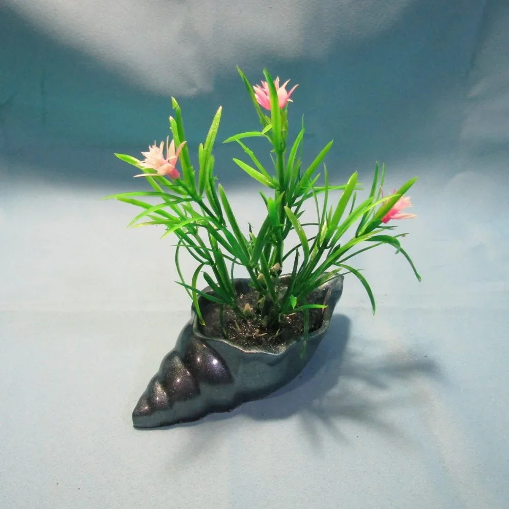 Aquarium Decoration -Teal Blue Long Shell with Flowering Plant.